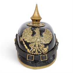 WWI Prussian M1895 Pickelhaube, the black leather skull with brass spike finial, brass eag...