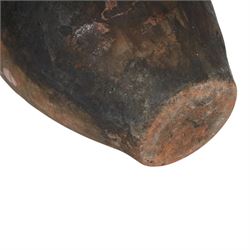 Three early 20th century Spanish part glazed terracotta storage vessels, the first example of bellied form with rounded base and twin loop handles, H24cm, the second of baluster for with close set loop handles, H30cm, and the third smaller also of baluster form with single loop handle, H24cm