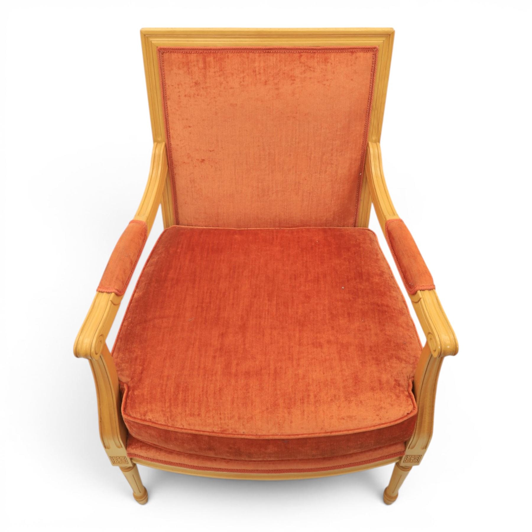 Pair of mid-20th century beechwood fauteuil armchairs, upholstered backrest and seat in terracotta velvet fabric, padded armrests with scroll detail, on tapered fluted supports with carved floral rosette blocks (very modern and not a desirable timber)