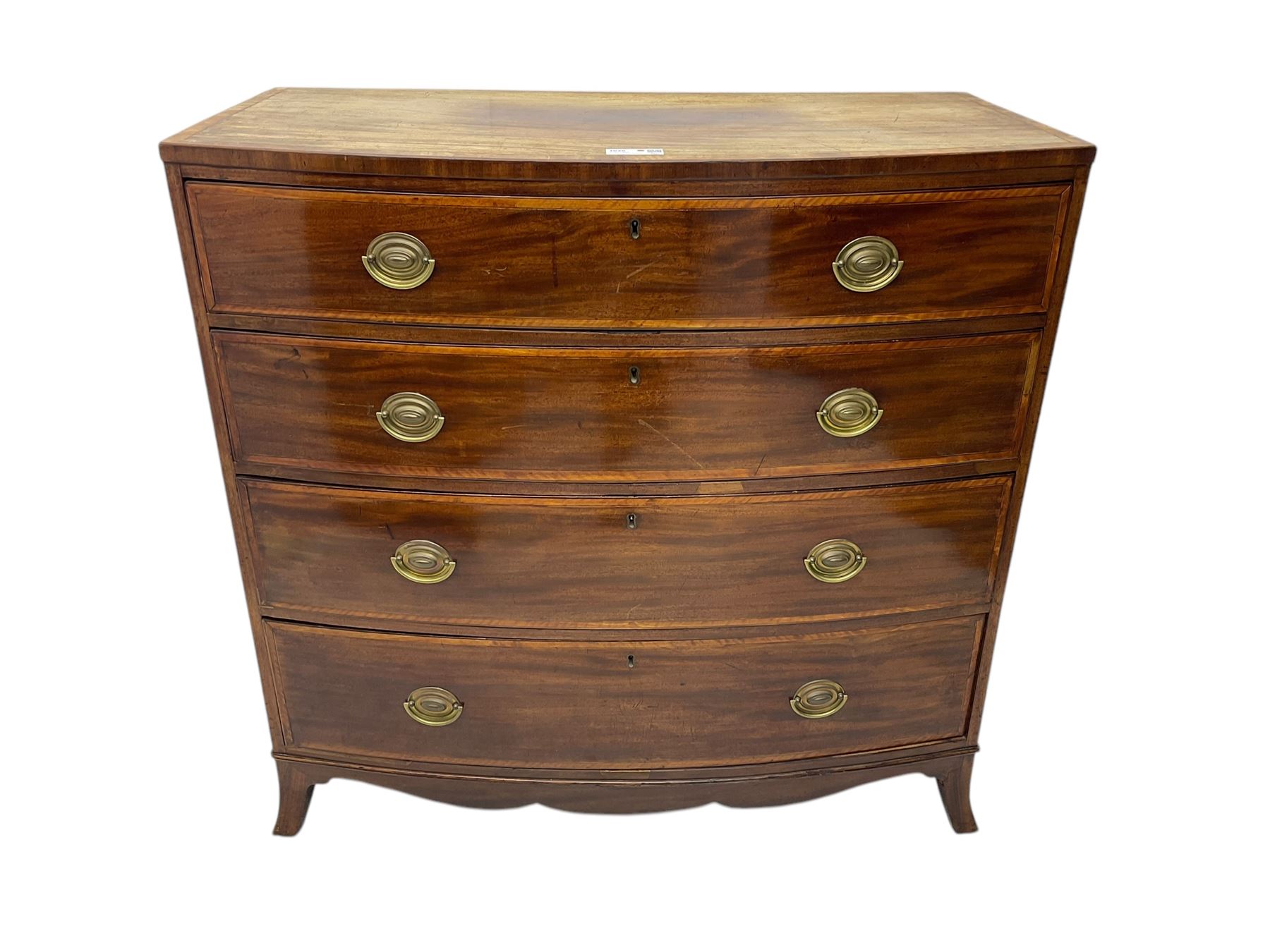 George III mahogany bow-front chest of drawers, four graduated drawers with oval brass handles, raised on splayed bracket feet with a shaped apron