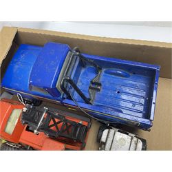 Tonka - fourteen pressed steel vehicles including Pick-up Truck, Tractor Digger, Mobile Crane, Trencher, Beach Buggy, two Bulldozers, Digger, Low Loader, Farm Trucks etc; and small quantity of spare parts (14)