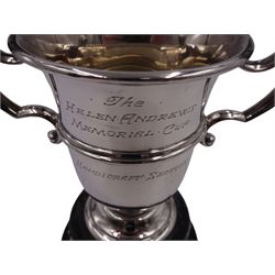 1920s silver trophy cup, with twin scroll handles and girdle, upon circular stepped foot,  the body with presentation engraving 'The Helen Andrews Memorial Cup, Handicraft Section', hallmarked Walker & Hall 1927, fixed upon ebonised wooden base with applied winners plaques, including base H18cm