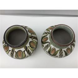 Pair of Denby Glyn Colledge stoneware vases of baluster form with floral decoration over cream ground, together two jardiniere in a similar design, vases H24cm