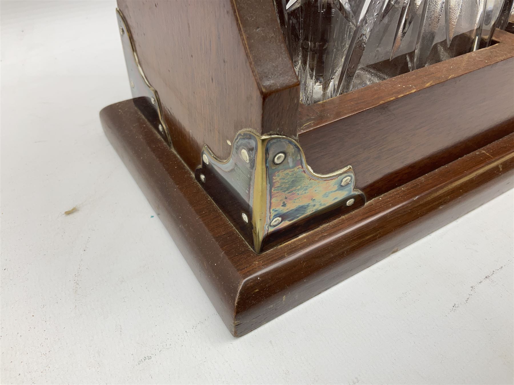 Late 20th century mahogany and silver plated two cut glass decanter tantalus, marked PB&S, with Whisky and Gin Crown Staffordshire ceramic decanter labels, H32cm