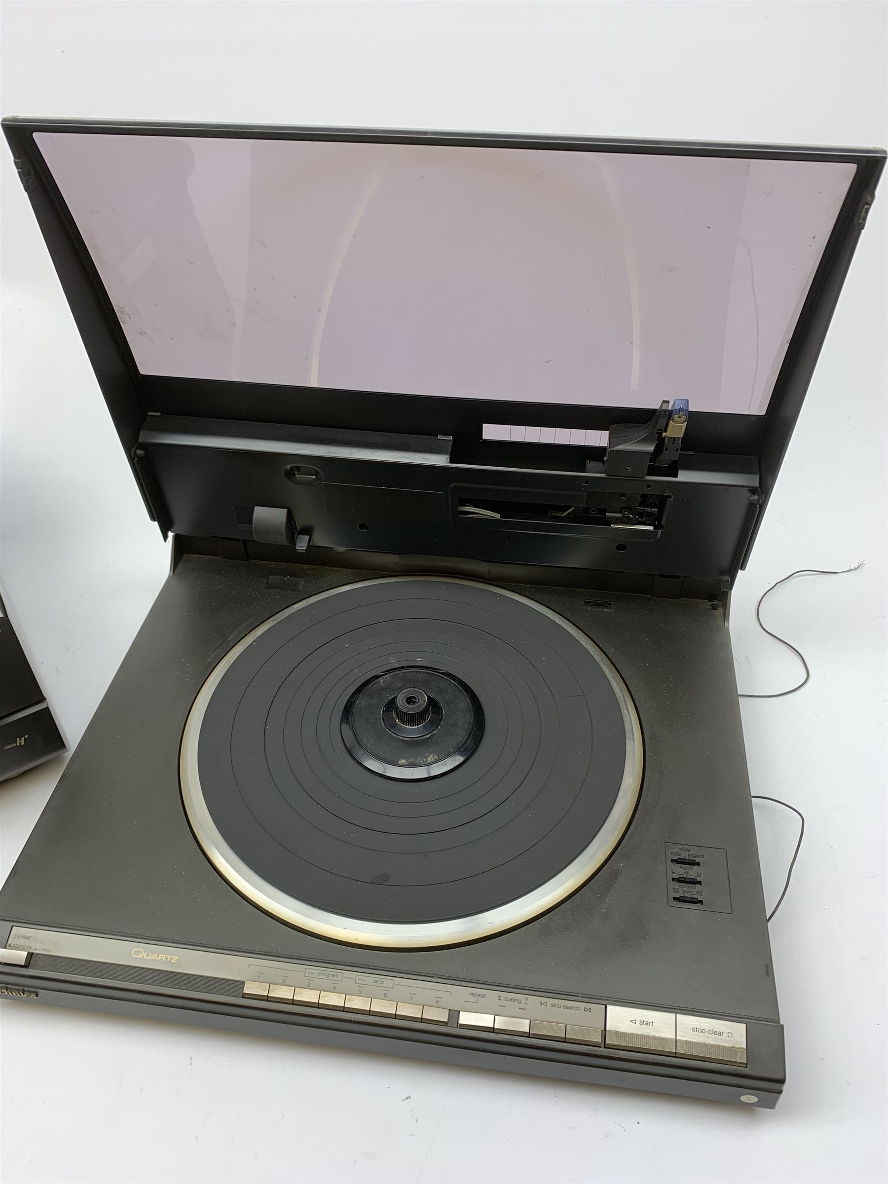 Technics SL-L3 Quartz Direct Drive Automatic Turntable System together with a Technics AV Control Stereo Receiver SA-AX720, both with original boxes