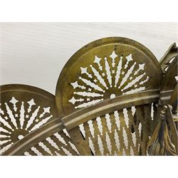 Pierced brass peacock style folding fire screen, with urn finial, H65.5cm