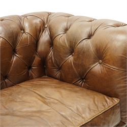 Timothy Oulton for Halo - two seater brown leather chesterfield settee, of traditional shape with rolled back and arms, upholstered in back-buttoned tan leather with loose seat cushions, raised on turned feet