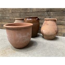 Pair of terracotta water jugs, H46cm, glazed pancheon and a circular planter (4)