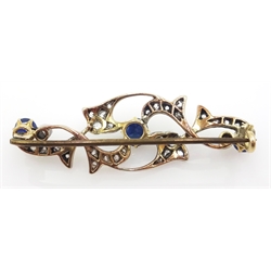  Early 20th century brooch set with three principal sapphires and two diamonds with diamond set leaves  