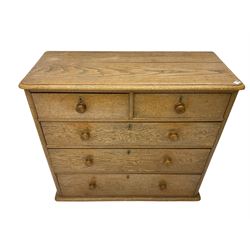 Victorian oak chest, fitted with two short and thee long drawers