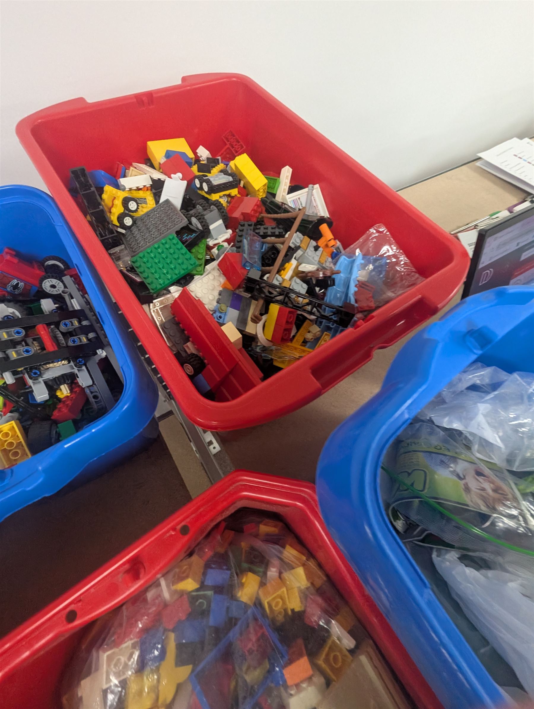 Large collection of loose Lego in six coloured plastic boxes