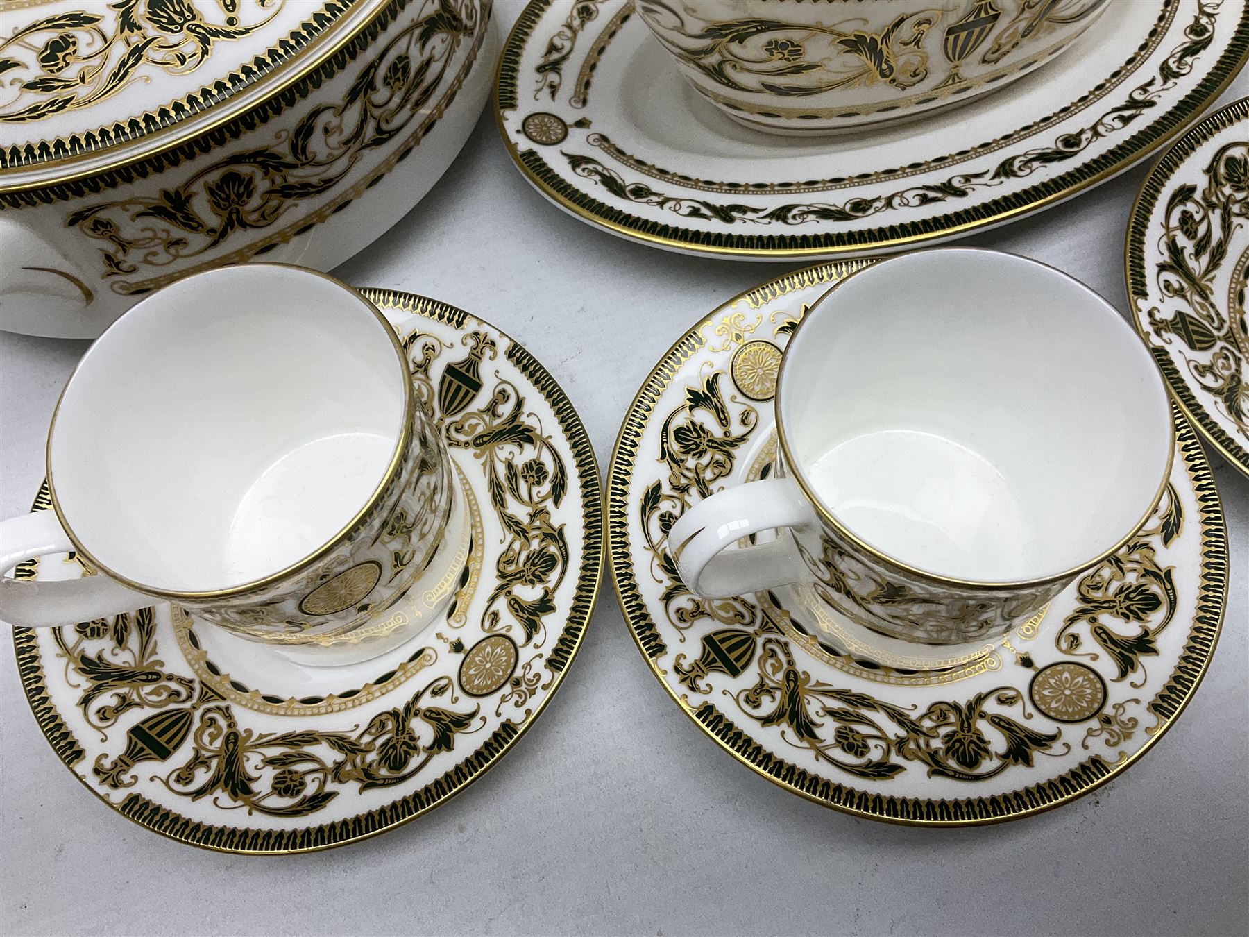 Royal Worcester Windsor pattern part tea and dinner service, comprising nine dinner plates, nine side plates, nine dessert plates, six coffee cans and saucers, sauce boat and plate, two covered tureens, oval dish and serving platter (35)