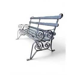 Coalbrookdale - rare pair of wrought iron and slatted wood garden benches, the twin wrought iron strapwork bench-ends formed of four scrolls over splayed feet, number 77 in the Coalbrookdale Castings Catalogue (see illustration)