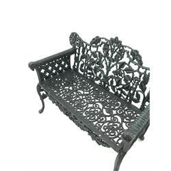 Pair Victorian style cast iron garden benches, ornate interlacing foliage and shaped back, scroll work seat, the leaf moulded arms with rams head terminals, shaped and splayed supports

Location: Duggleby Storage, Scarborough Business Park YO11 3TX