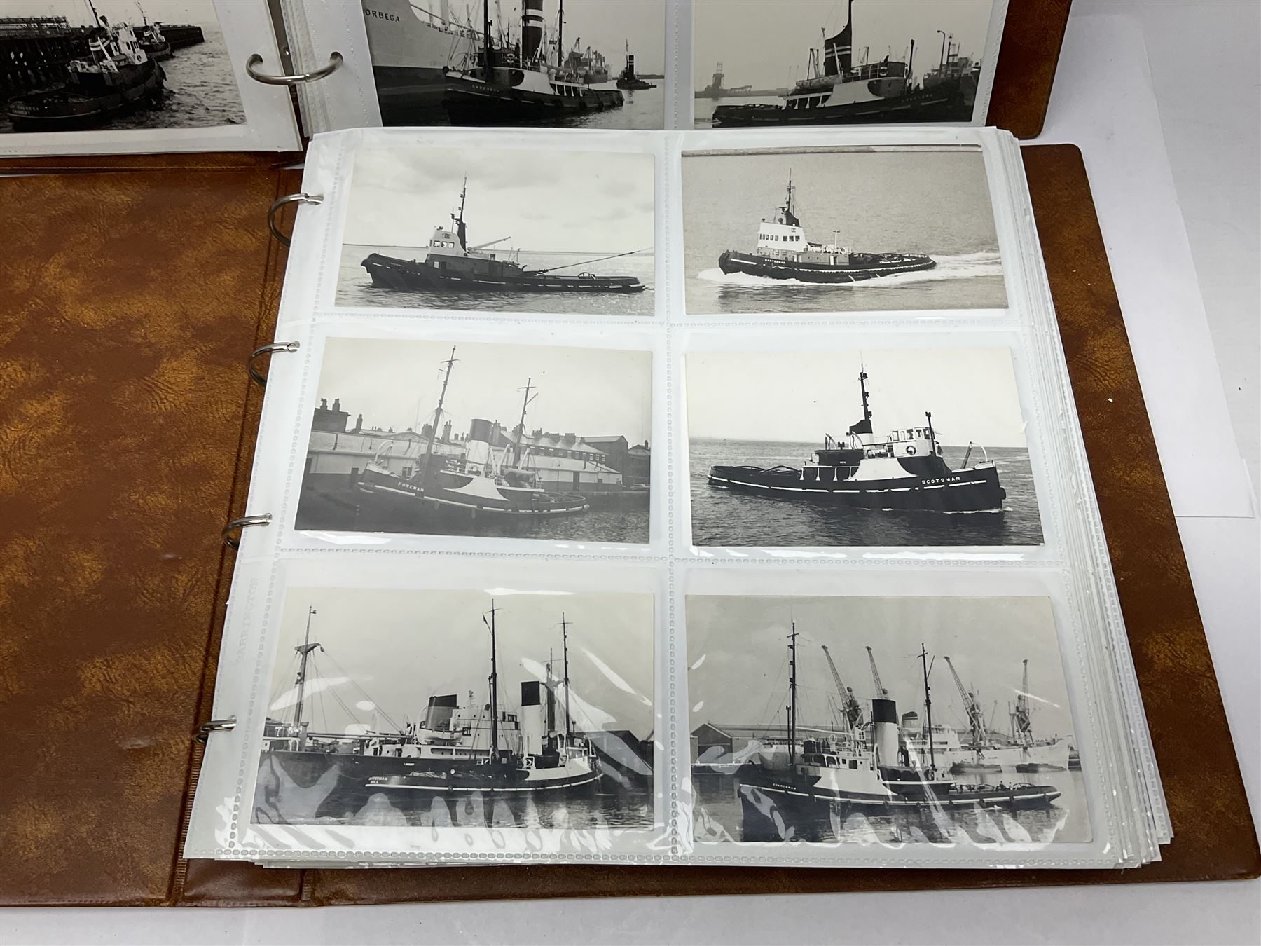 Collection of loose Edwardian and later postcards, mostly topographical examples depicting East Yorkshire, Hull and the East Coast, including Hull, Bridlington, Staithes, Flamborough Head, Beverley, etc., and a quantity of other postcards, plus two photograph albums containing photographs of trawlers