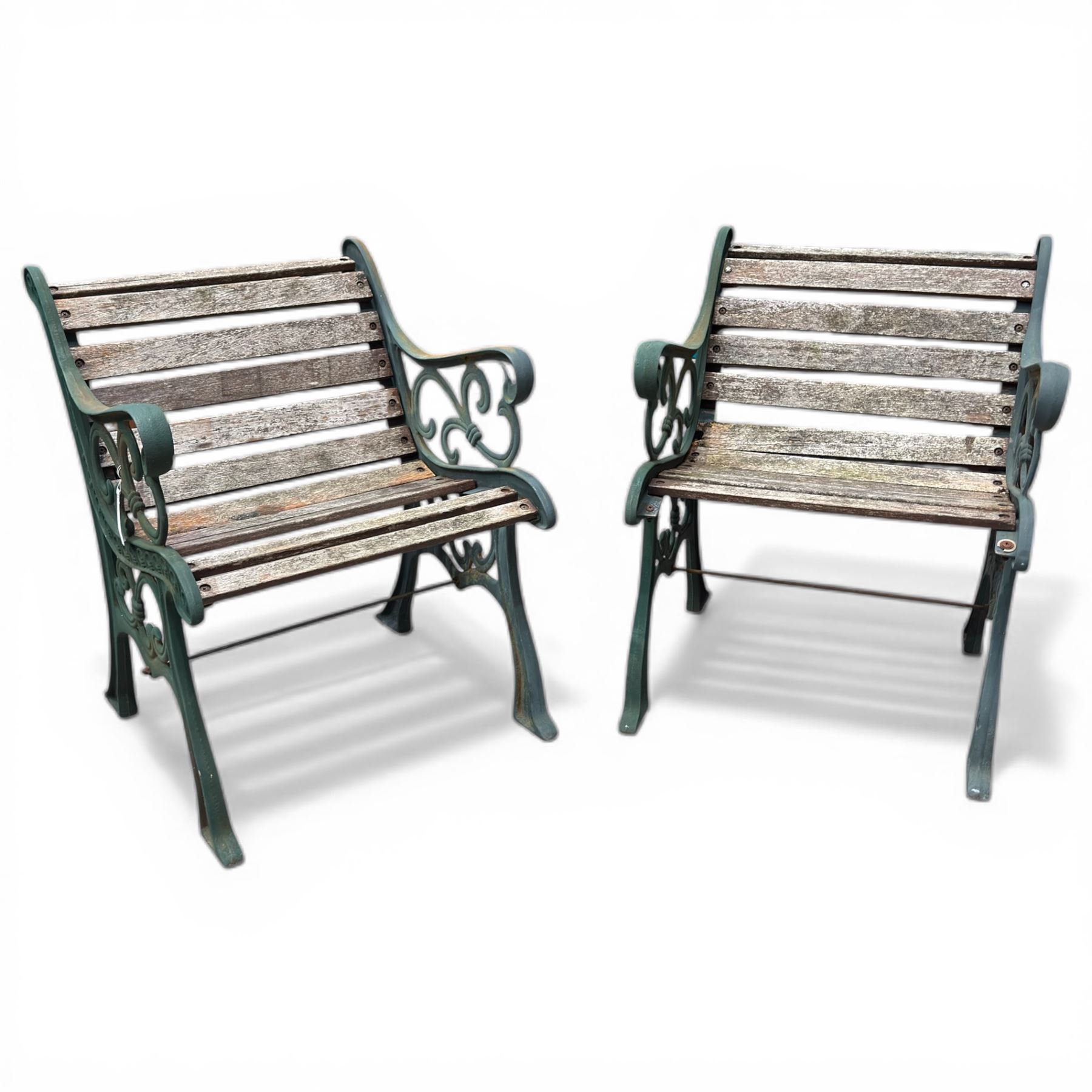 Pair of cast iron and wooden slatted chairs