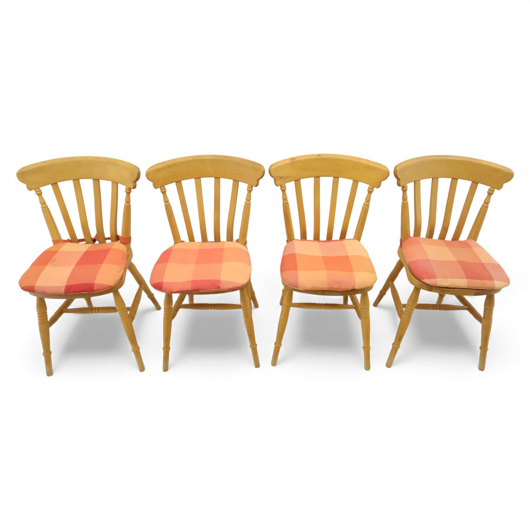 Late 20th century pine farmhouse dining table, rectangular top raised on turned legs, together with a set of matching spindle-back chairs with padded seats