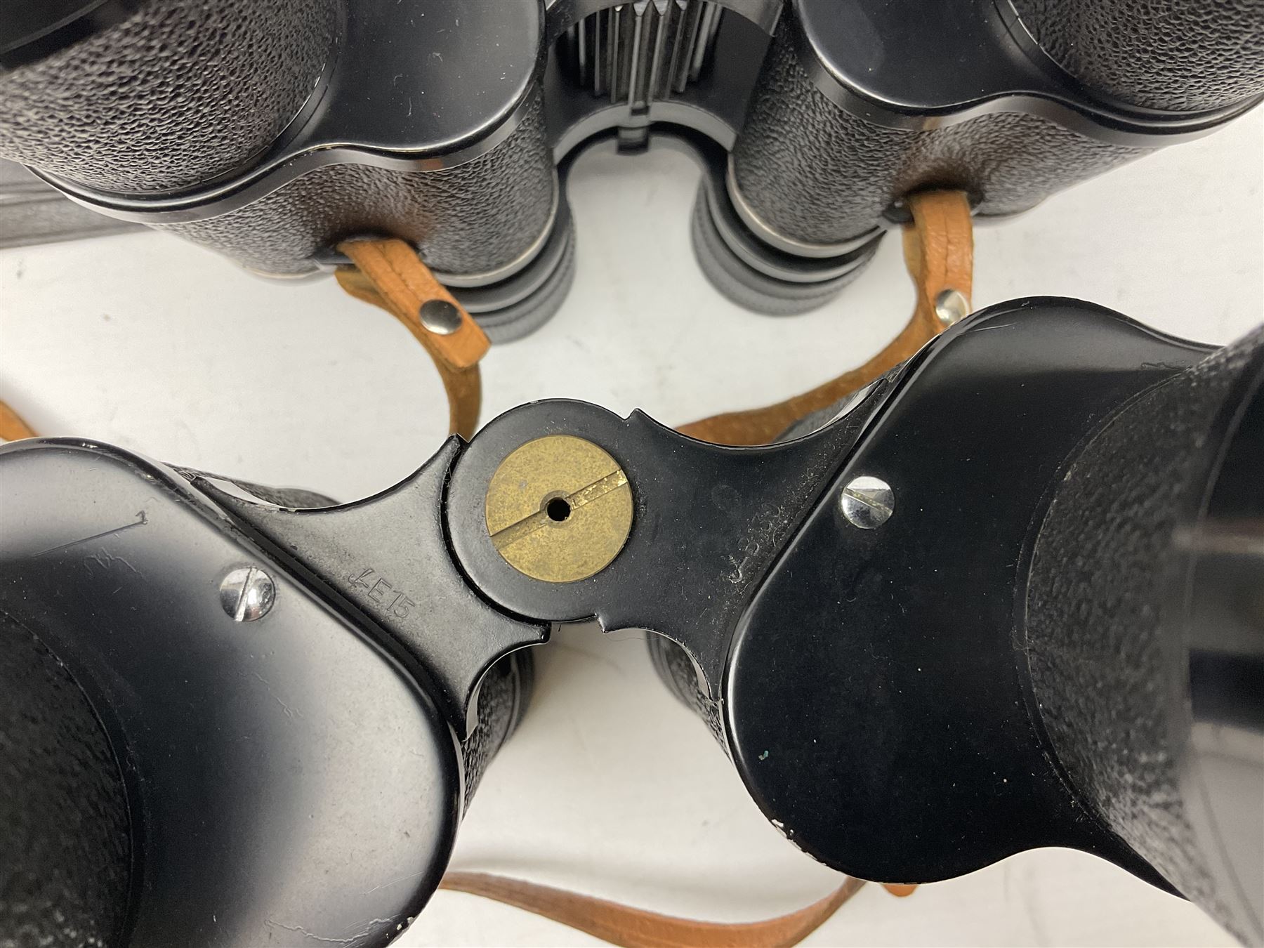 Eleven pairs of binoculars to include Lieberman & Gortz 20x65, Stem (USSR) 7x50, Helios 10x50 Field, Prinz 12x50, Tasco 8x40, Tasco 10x50, etc