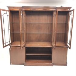 Wade Georgian style mahogany breakfront bookcase display cabinet, projecting cornice, dentil frieze, four doors enclosing six glazed shelves, eight graduating drawers flanking two cupboards, plinth base, W211cm, H203cm, D46cm