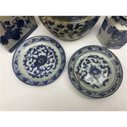 Two Chinese ceramic blue and white opium pillows with pierced ends, decorated with Dogs of Foo, together with two blue and white Kamcheng and other Chinese ceramics 