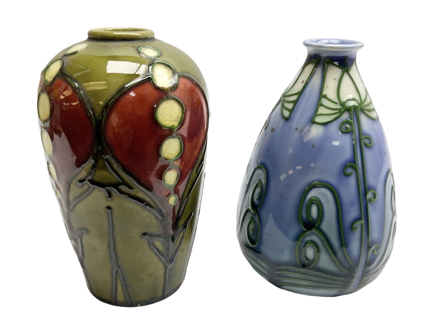Minton Secessionist vase, with tube-lined stylised flower head decoration on a blue ground, printed mark to base 'Minton Ltd, No. 30', together with another Minton Secessionist tubelined vase,  printed mark to base 'Minton Ltd, No. 16', tallest example H13.5cm