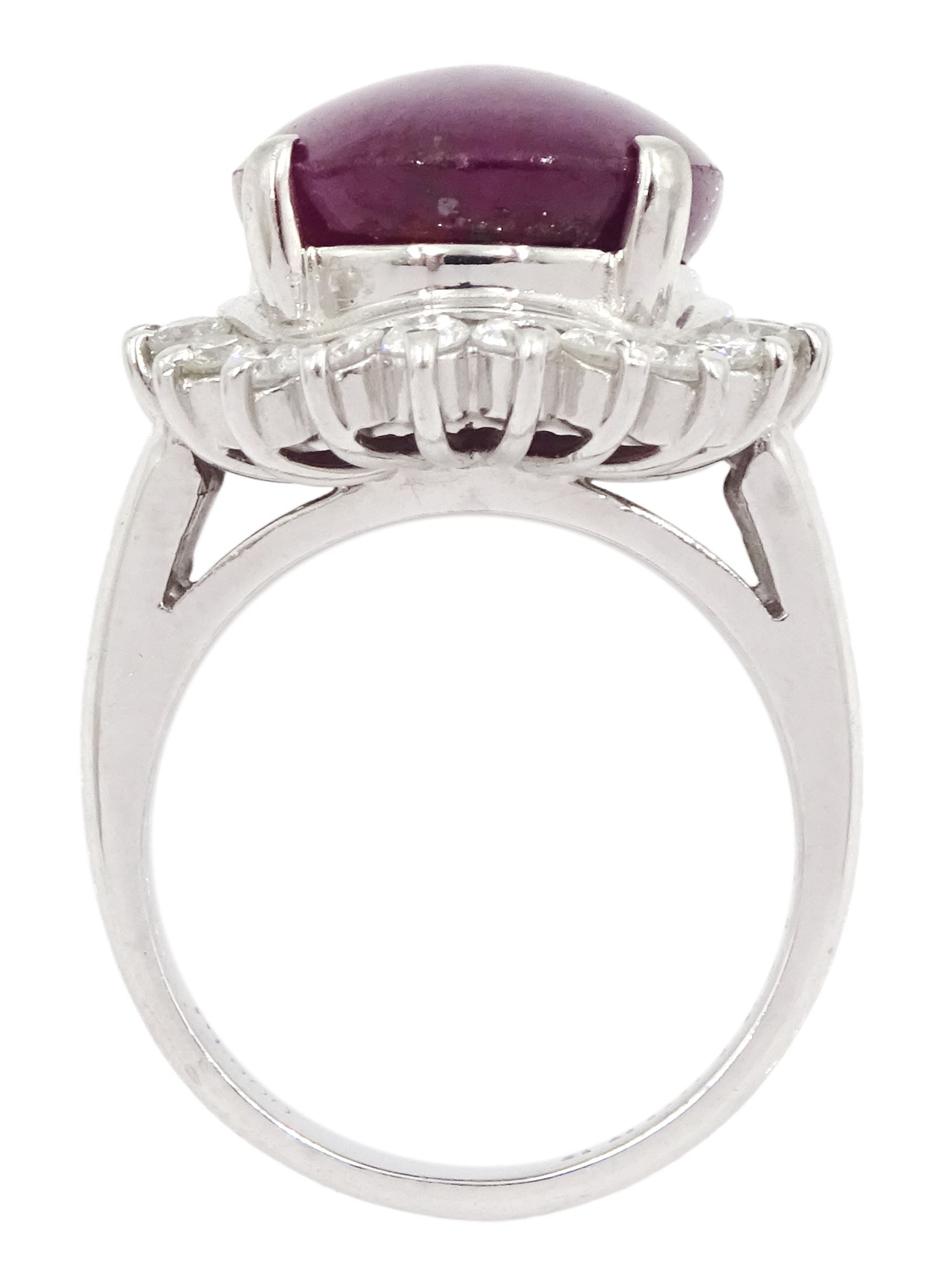 Platinum cabochon star ruby and round brilliant cut diamond cluster ring, stamped Pt900, ruby 12.57 carat, total diamond weight 0.88 carat