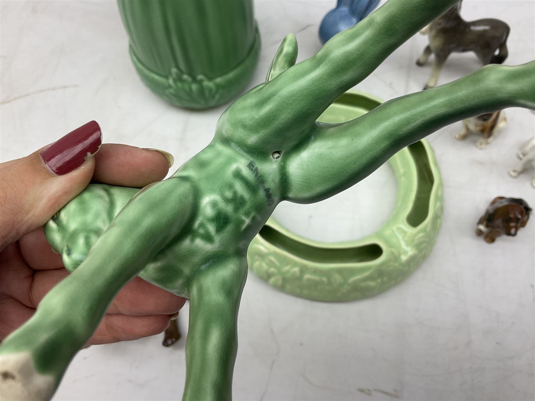 Sylvac blue rabbit no. 1067, green horse no. 1334, jug with squirrel handle no. 1958 (a/f), Royal Doulton dog figure, and other ceramics in one box