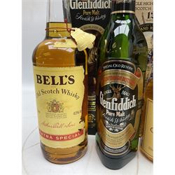 Glen Moray 12 Year Single Malt Highland Scotch Whisky, 70cl 40% vol, one bottle, in Highland Regiments The Black Watch presentation tin, Glenfiddich Pure Malt Scotch Whisky, Special Old Reserve, 70cl 40% vol, one bottle, in Clan Murray presentation tin, Bell's Extra Special Old Scotch Whisky, Aged 8 Years, 70cl 40% vol, one bottle, in box and Bell's Extra Special Old Scotch Whisky, 1l, 43% vol (4)