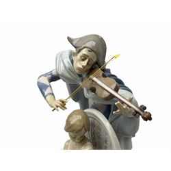 Large Lladro figure, Jester Serenade, modelled as a ballerina with bouquet of flowers seated before a jester playing the violin, with printed mark, impressed model number 5932 and signed beneath, H36.5cm