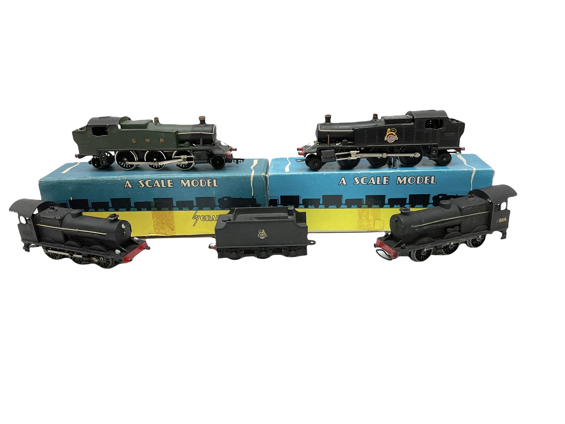 Graham Farish '00' gauge - four locomotives comprising GWR Class 81xx 2-6-2 Prairie Tank in BR black, cast No.8103; GWR Class 81xx 2-6-2 Prairie Tank in GWR green, cast No.8103; both in original boxes; Southern Class Q 0-6-0 with tender, cab sides cast with FORMO, in BR black; and another 0-6-0 with personalised gilt No.564; both unboxed (4)