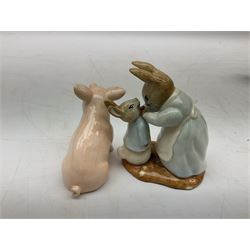 John Beswick figure of a seated piglet, Beswick Beatrix Potter Mrs Rabbit and Peter figure, and quantity of Sandland Character Ware jugs