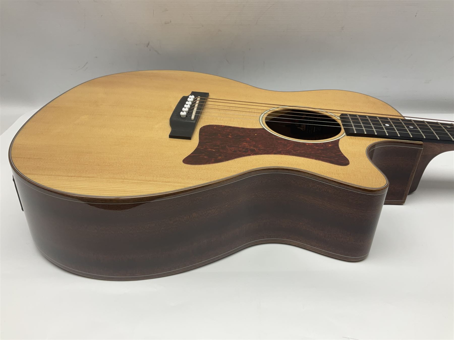 Sigma GMC-1E semi-acoustic guitar with cut-away body, sapele mahogany back and ribs and solid spruce top; bears label Model GMC-1E serial no.210522747; L103cm