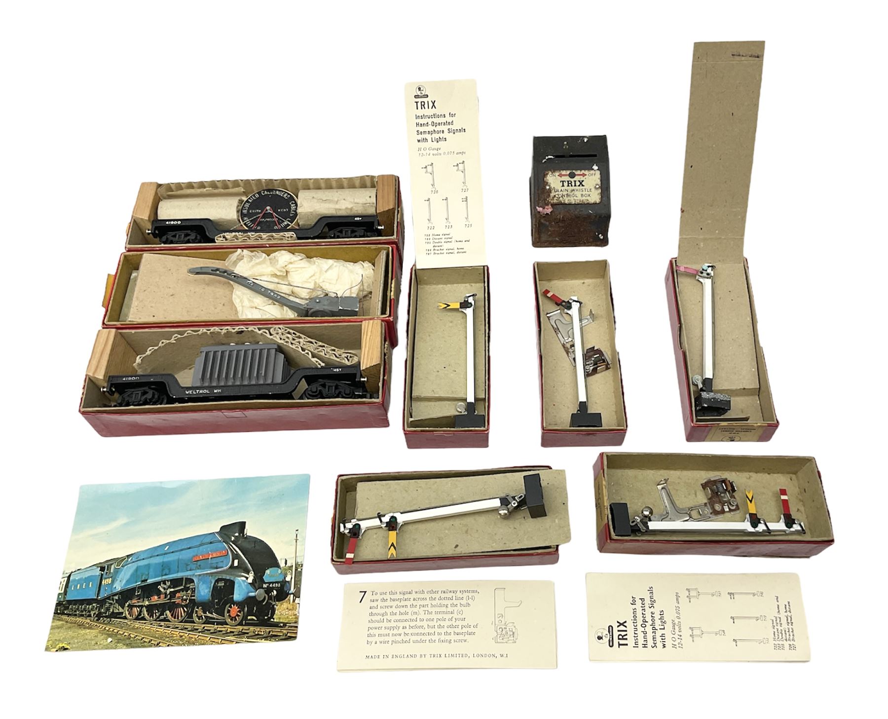 Trix Twin railway - two Weltrol wagons Nos.679 & 680 with factory packaging; Crane on Base No.715; and five various signals (three with instructions); all boxed (8)
