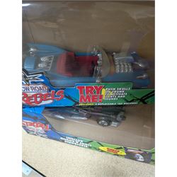 Collection of wrestler figures, two WCW Road Rebels vehicles and a collection of accessories