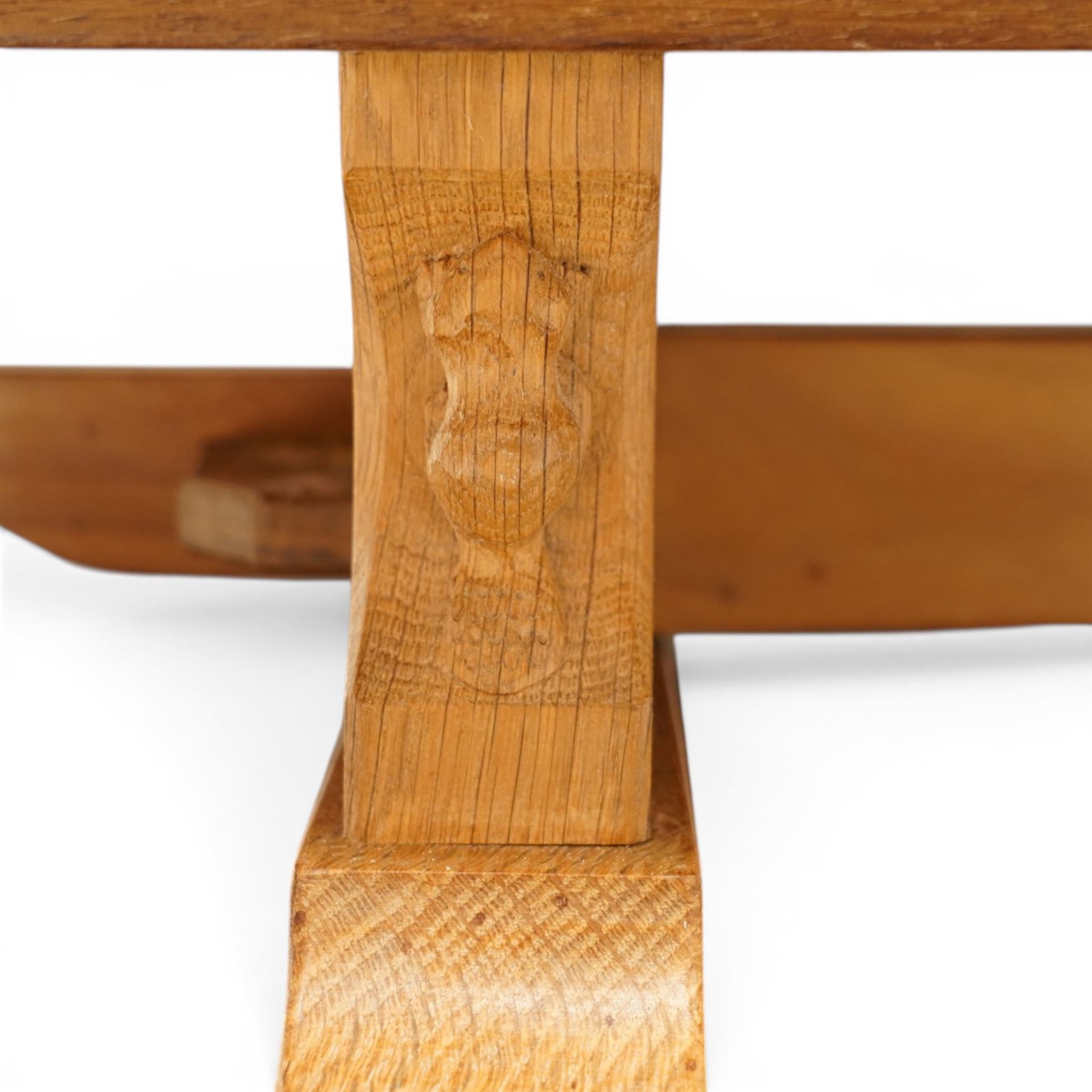 Beaverman - 1980s adzed oak sideboard raised on a trestle base, three drawers over three cupboards with Yorkshire Rose carved handles, fielded panelled sides and front, with carved Beaver, by Colin Almack of Sutton near Thirsk