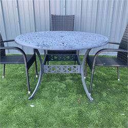 Cast aluminium garden table and four rattan chairs - THIS LOT IS TO BE COLLECTED BY APPOINTMENT FROM DUGGLEBY STORAGE, GREAT HILL, EASTFIELD, SCARBOROUGH, YO11 3TX