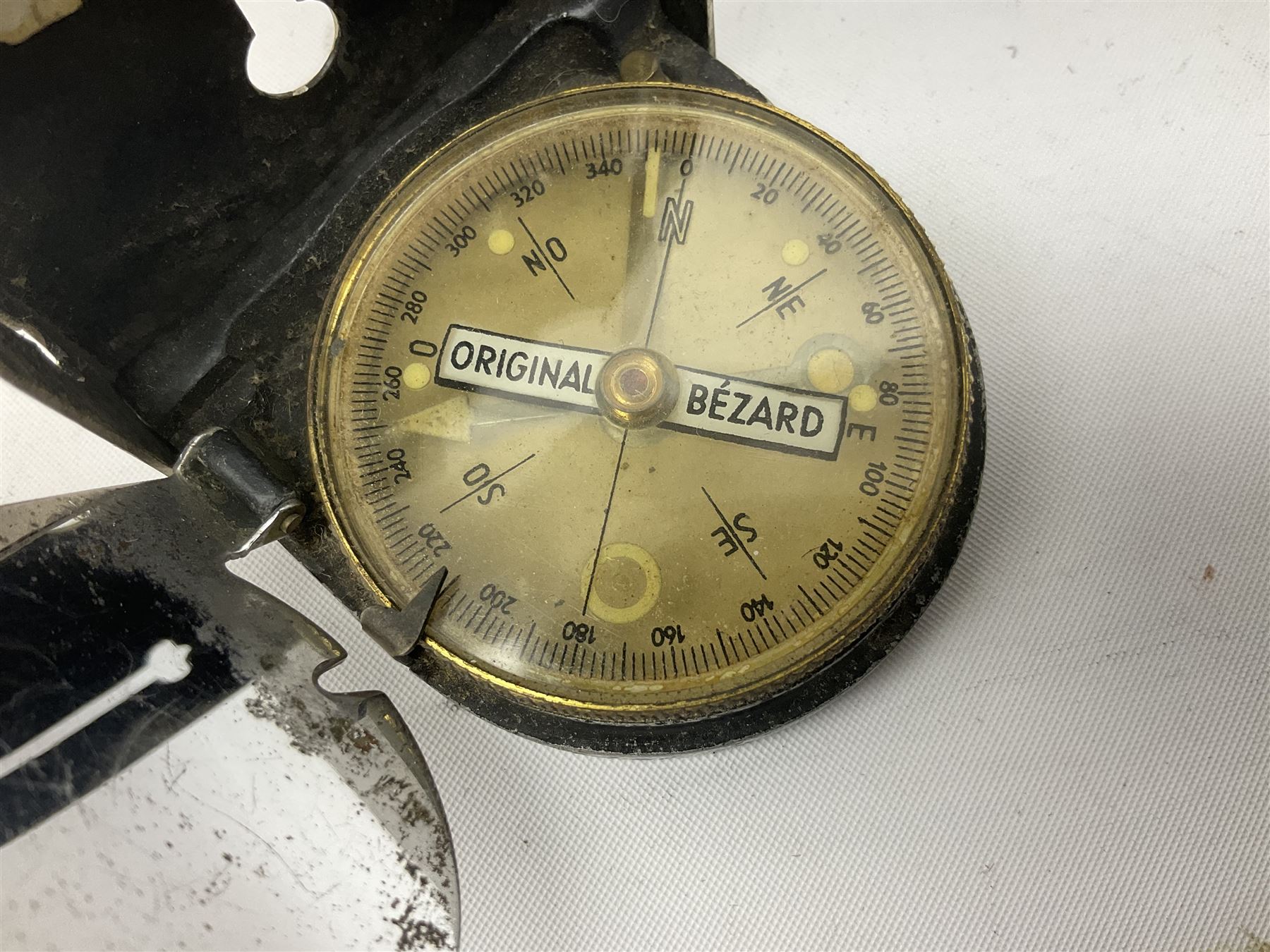 WW2 German - Lufft made compass marked ' Original Bezard ' with heliograph signalling mirror to interior; and a K98 rifle cleaning kit in original tin (2)