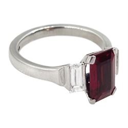 18ct white gold ruby and diamond three stone ring, single emerald cut Thai ruby of approx 2.00 carat, with a baguette cut diamond set either side, hallmarked, total diamond weight approx 0.60 carat