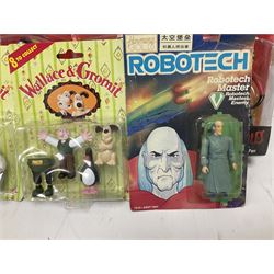 Twenty-three carded action figures including Fantasy VIII (6), Hercules (3), MIB (2), Robocop (2), The Golden Compass, The Incredibles (3), Wallace & Gromit (3), Robotech (2) and GI Joe; all in unopened blister packs (23)
