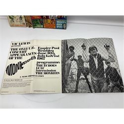 Monkees memorabilia - 'Monkees Monthly' magazine almost complete run from No.1 Feb 67 to No.31 Aug 69 (lacking nos.29 and 32); the cover of No.1 signed by all four members of the group during their 1997 Reunion Tour; quantity of A&BC bubble gum cards; programme for their only UK live performance in 1967 at Empire Pool Wembley; and other related late 1960s music magazines/paperback book