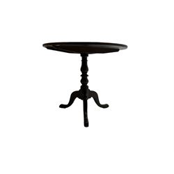 Late 19th century oak tilt-top tripod table, circular top over turned pedestal with cabriole supports