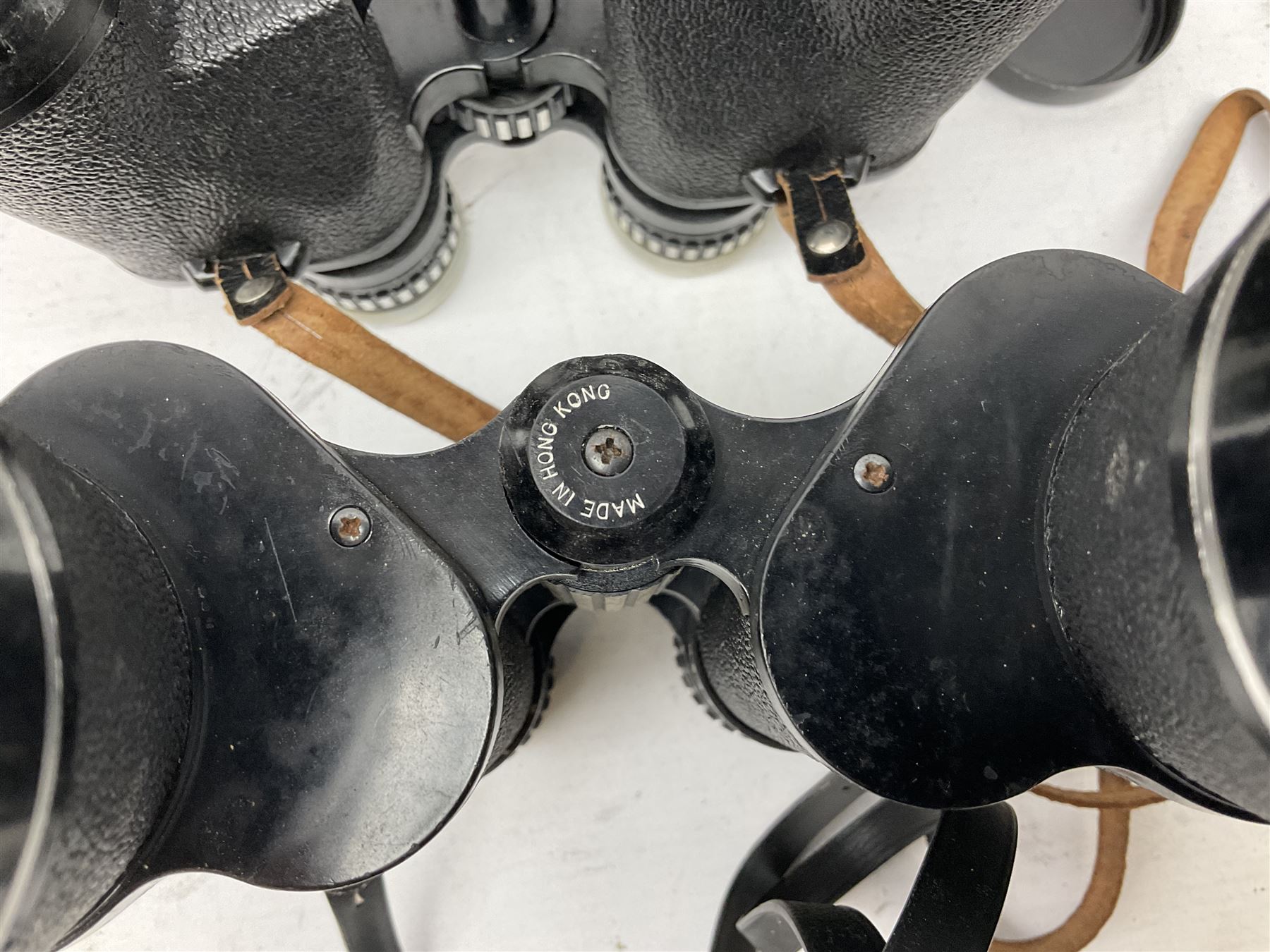 Nine cased pairs of binoculars, to include Embassy 8x40, Tasco 7x35, Zenith 10x50 Field. Opticron 10x50, Swift 8x40 Grand Prix Mk I, etc