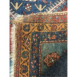 Turkish runner rug, red ground with quadruple pole medallion, three band border decorated with flower heads, 318cm x 91cm