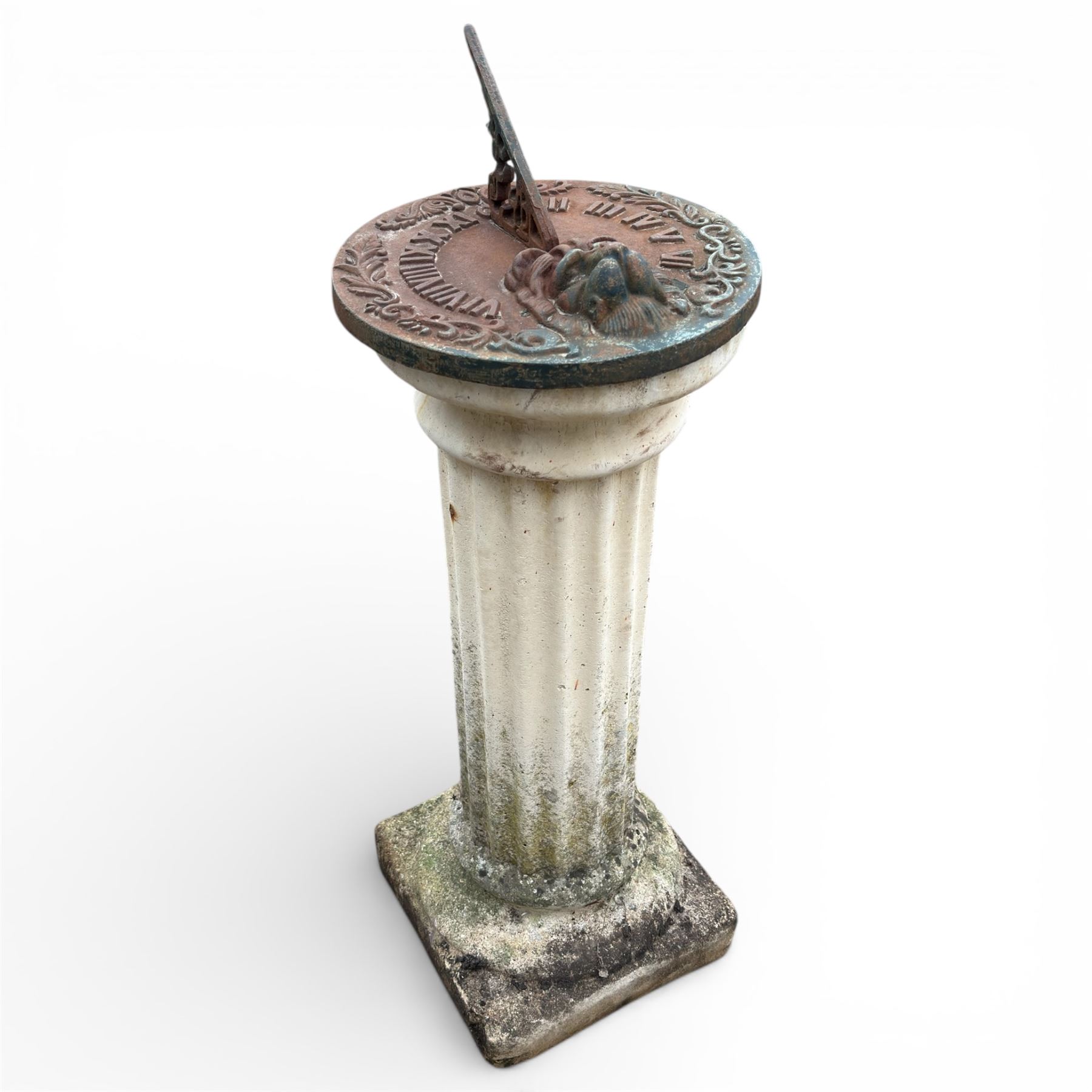 Cast stone garden sundial featuring a cast iron top with Roman numerals and lions head motif
