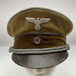 WW2 German Political Leaders brown cloth visor cap with metal insignia; labelled K. Hartel Weiden