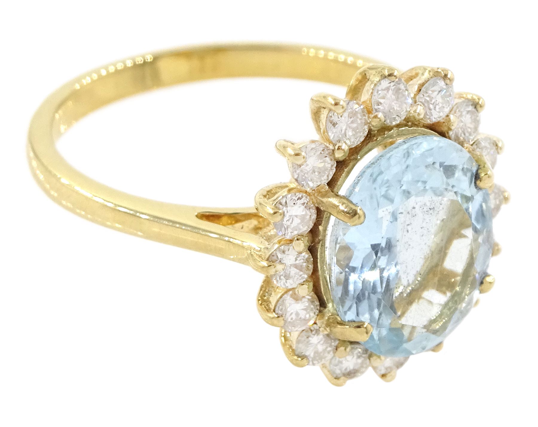 18ct gold aquamarine and diamond cluster ring, single oval cut aquamarine of approx 2.05 carat, with sixteen round brilliant cut diamond surround, stamped, total diamond weight approx 0.40 carat