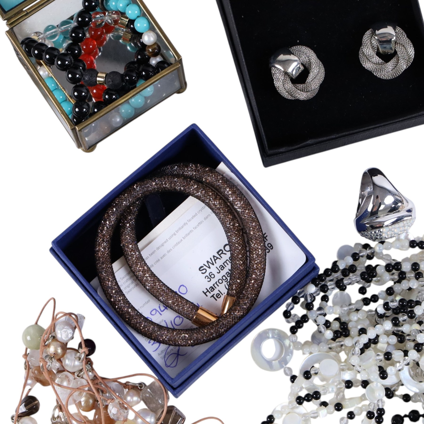 Collection of boxed Swarovski crystal jewellery, including statement necklaces, rings, bracelets and earrings, and a collection of costume jewellery including beaded necklaces