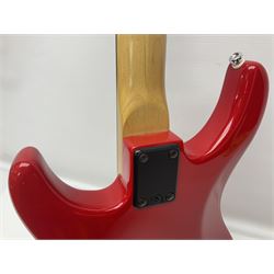 American Peavey Nitro 1 hand-made electric guitar in red with Kahler tremolo, serial no.02786479, L98cm overall; in soft carrying case.