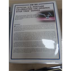 Star Trek collectables, including Danbury Mint '22ct Gold Card Collection', PCS Stamps and Coins Official US Postage Celebrating The Original Star Trek Series, Star Trek St Vincent and Grenadines first day cover collection, four stamp sets and a framed set of similar stamps, commemorative coins, Star Trek The Experience Las Vegas coin, three commemorative 'gold stamps' and three albums of collectors cards and telephone cards