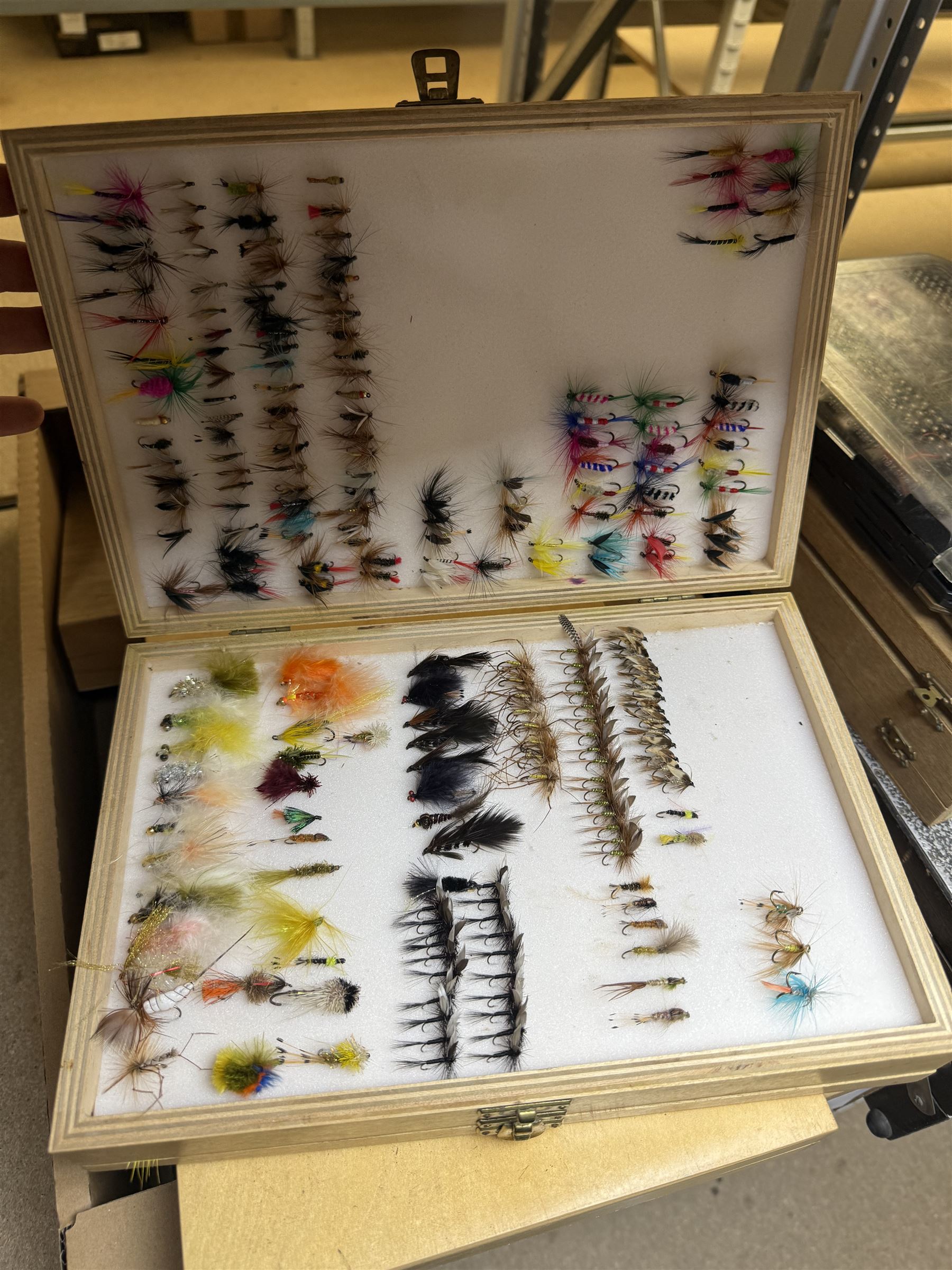 Collection of fishing equipment, including lures, floats and flies 